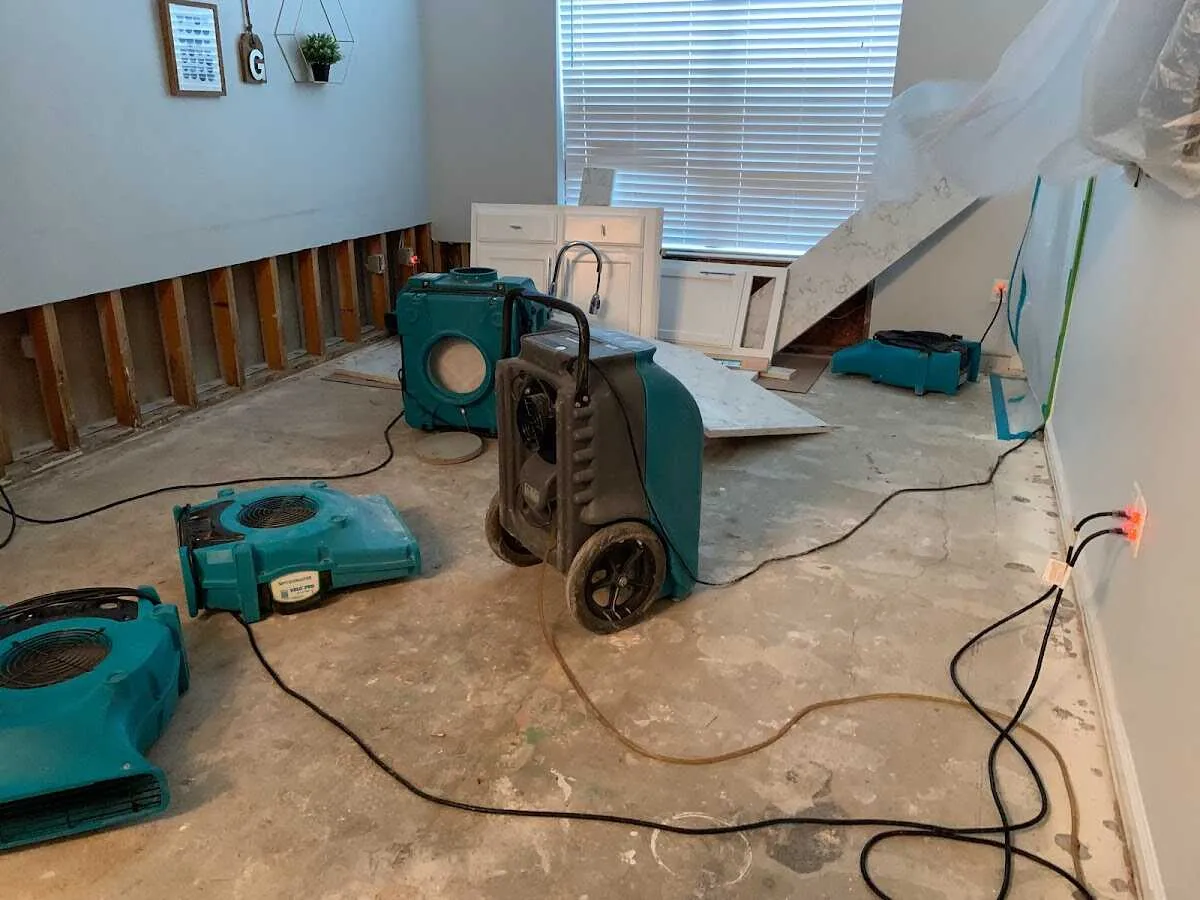 Dehumidifier in flood-cut room for Water Damage Restoration in Westgate